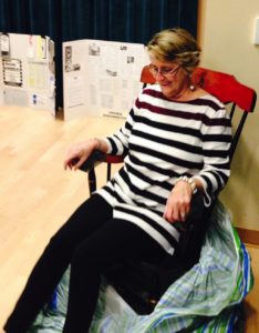 Wagner settles in her new rocking chair, a gift for her leadership of VSF.